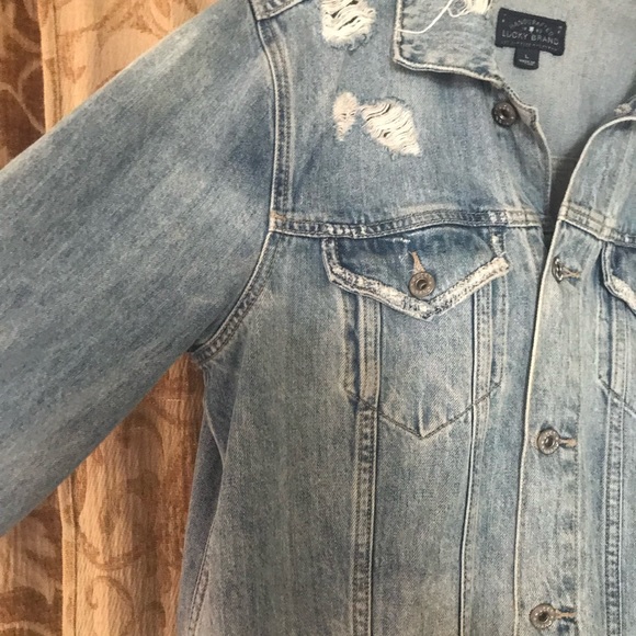 Distressed jean jacket, lots of rips and vintage looking. Comfy too - Picture 3 of 7